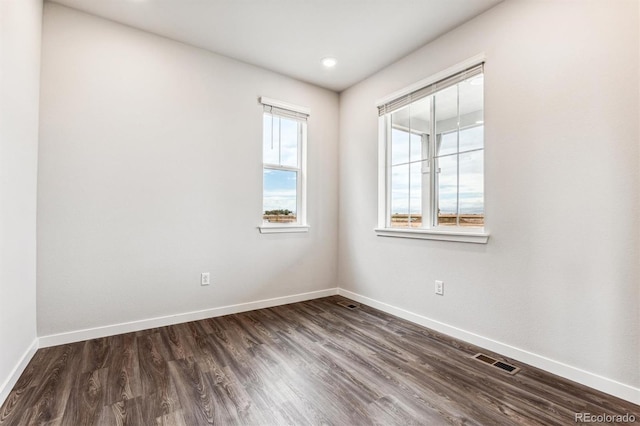 14440 Ranch St, Mead, CO 80504 - empty room featuring baseboards and dark wood-type flooring