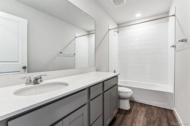 14440 Ranch St, Mead, CO 80504 - full bath featuring wood finished floors, vanity, and shower / bath combination