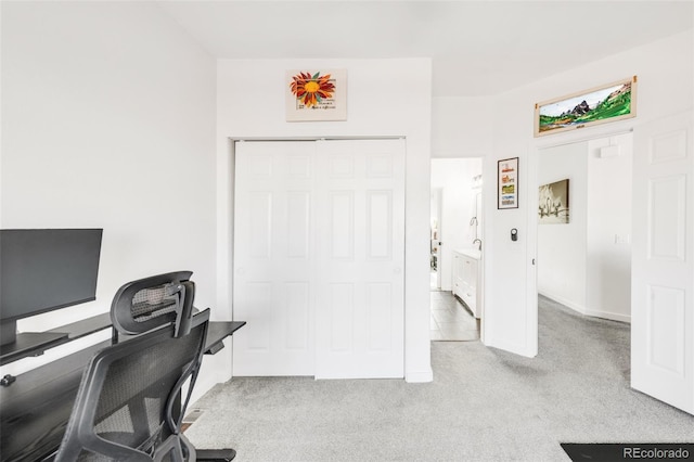 office space featuring light colored carpet