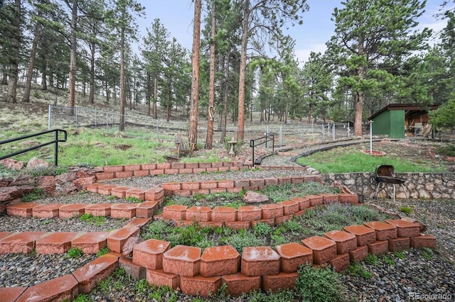 2169 Vigilante Ave, Bailey, CO 80421 - view of yard with a shed and view of scattered trees