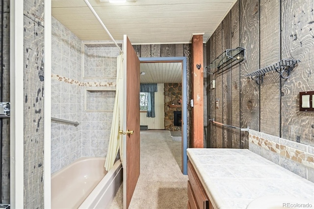 2169 Vigilante Ave, Bailey, CO 80421 - bathroom with vanity, shower / bath combo with shower curtain, and wood ceiling