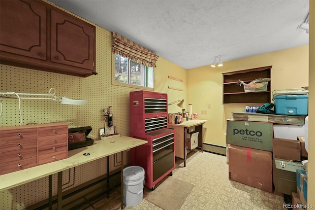 2169 Vigilante Ave, Bailey, CO 80421 - kitchen with a baseboard radiator, open shelves, and a textured ceiling
