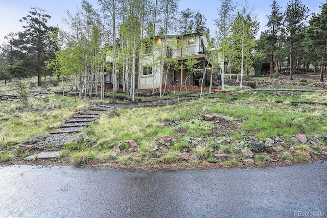 2169 Vigilante Ave, Bailey, CO 80421 - view of front facade with stairs and a deck