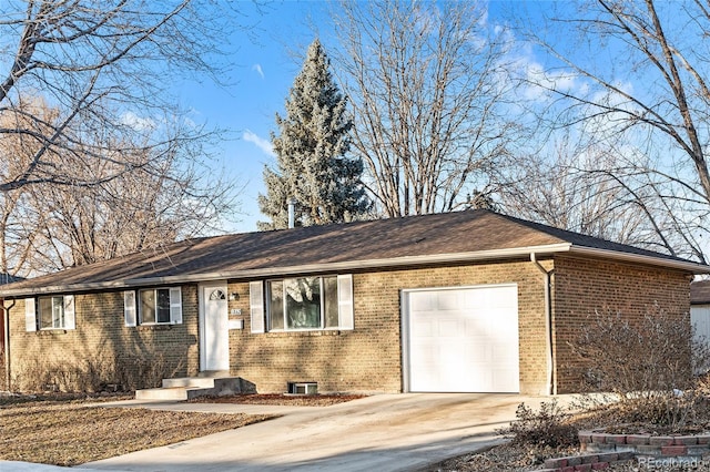 ranch-style home with a garage