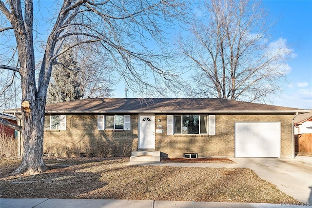 ranch-style home with a garage