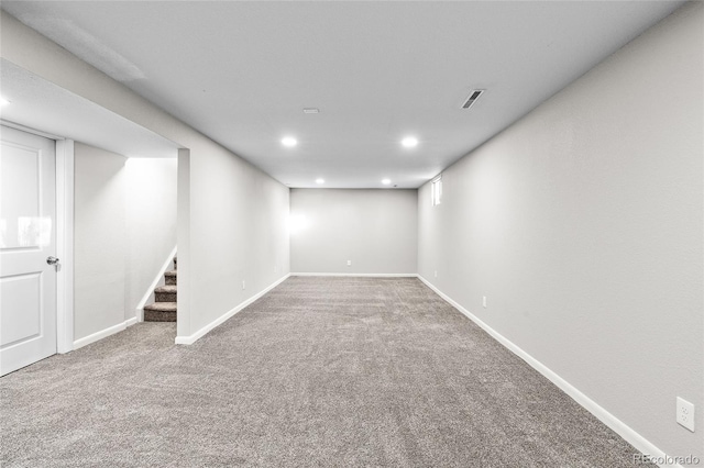 basement featuring carpet flooring