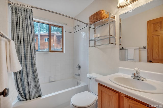 full bathroom with shower / tub combo, toilet, and vanity