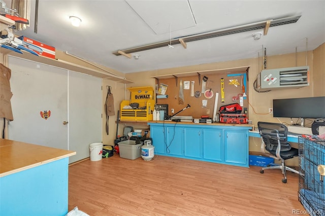 home office featuring attic access and light wood finished floors