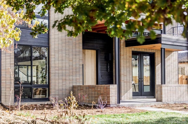 view of exterior entry with french doors