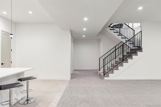 interior space featuring carpet flooring