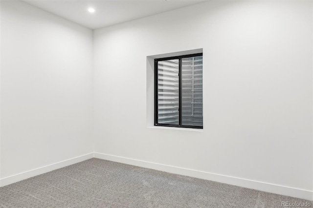 unfurnished room featuring carpet floors