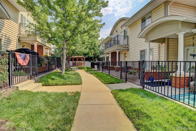 view of community featuring a yard