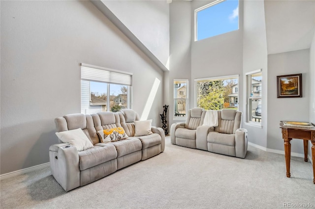 12551 W 84th Cir, Arvada, CO 80005 - living room featuring a wealth of natural light, a towering ceiling, and carpet