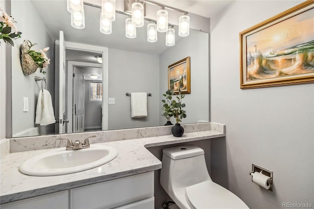 12551 W 84th Cir, Arvada, CO 80005 - half bathroom featuring vanity and toilet