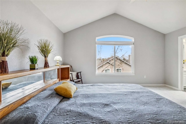 12551 W 84th Cir, Arvada, CO 80005 - carpeted bedroom featuring lofted ceiling and baseboards