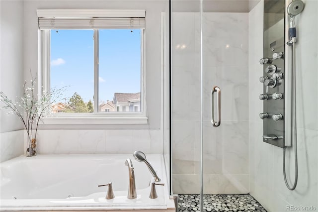 12551 W 84th Cir, Arvada, CO 80005 - full bathroom with a bath, a healthy amount of sunlight, and a stall shower