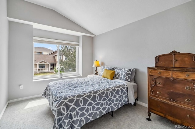 12551 W 84th Cir, Arvada, CO 80005 - bedroom featuring baseboards, vaulted ceiling, and carpet