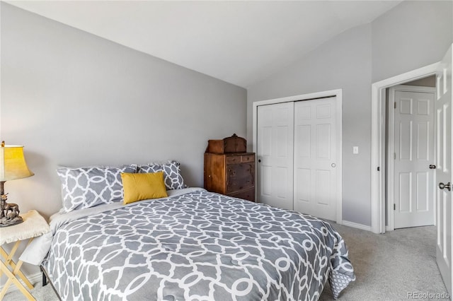 12551 W 84th Cir, Arvada, CO 80005 - carpeted bedroom with baseboards, lofted ceiling, and a closet
