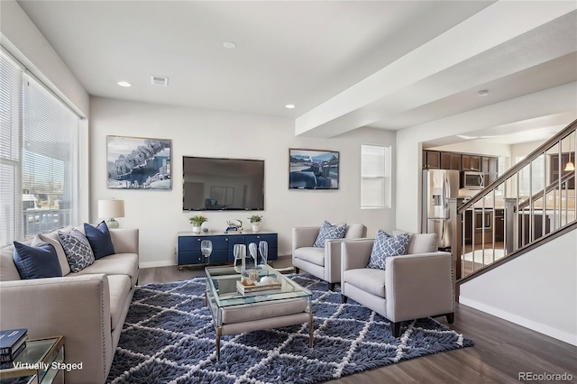 living room featuring dark hardwood / wood-style flooring