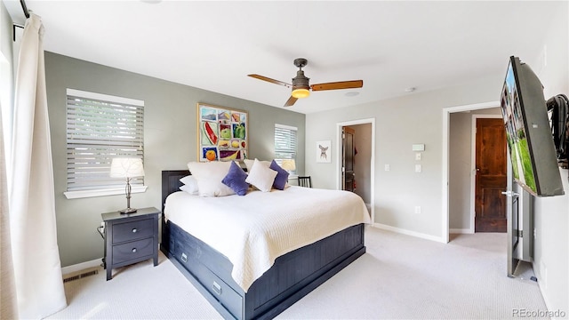 1426 S Pearl St, Denver, CO 80210 - bedroom with light carpet and ceiling fan