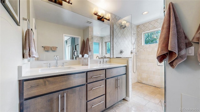 1426 S Pearl St, Denver, CO 80210 - full bath with double vanity, walk in shower, and tile patterned flooring