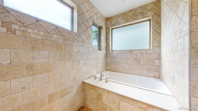 1426 S Pearl St, Denver, CO 80210 - full bathroom featuring a garden tub