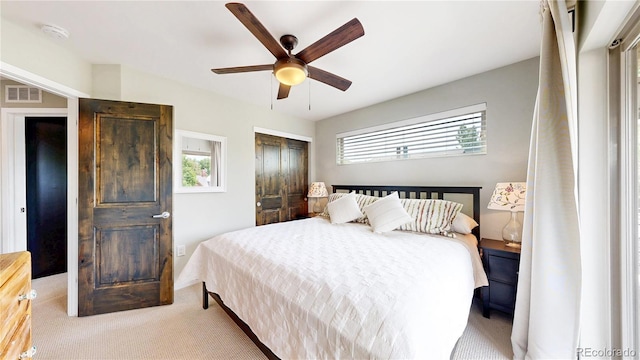 1426 S Pearl St, Denver, CO 80210 - carpeted bedroom with a closet and ceiling fan