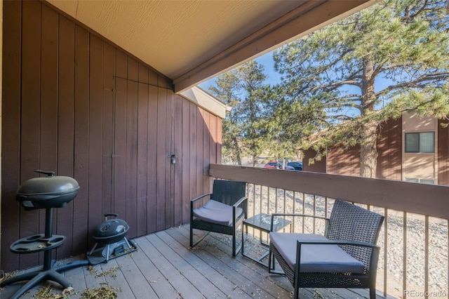 wooden deck with area for grilling