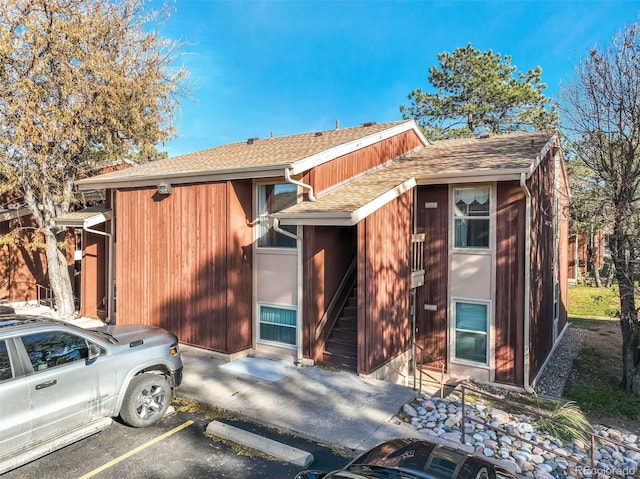 4477 N Carefree Cir Unit B, Colorado Springs, CO 80917 - view of front of property with roof with shingles and uncovered parking