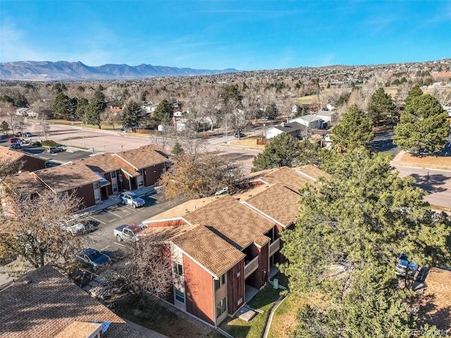 birds eye view of property with a mountain view