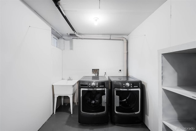 washroom with washing machine and dryer