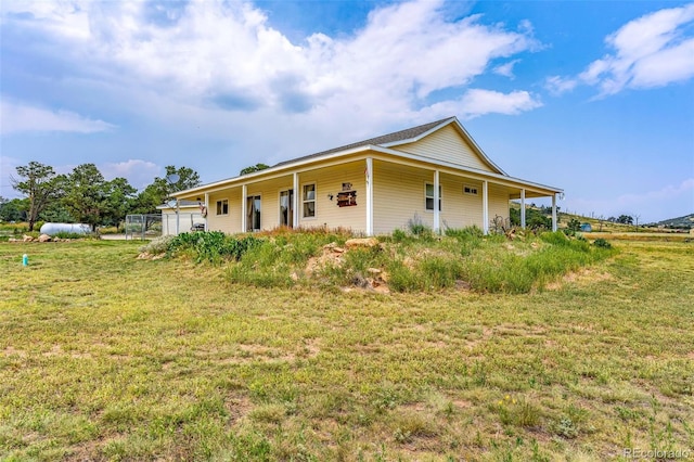 exterior space with a front lawn