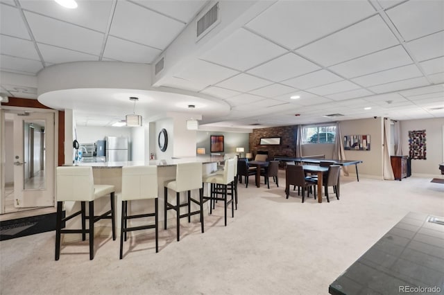 view of carpeted dining area