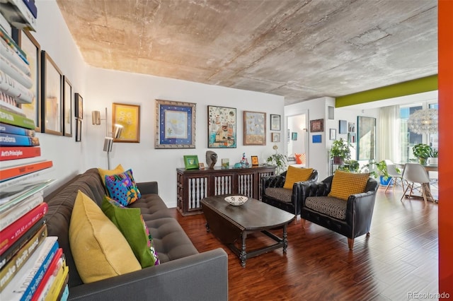 living room with dark hardwood / wood-style floors