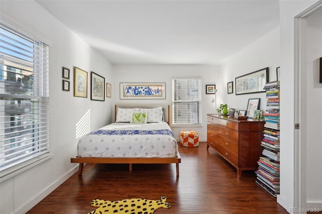 bedroom featuring dark hardwood / wood-style floors