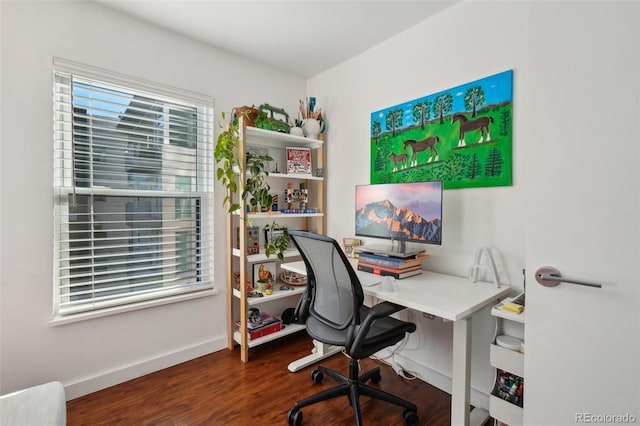 office space with dark wood-type flooring