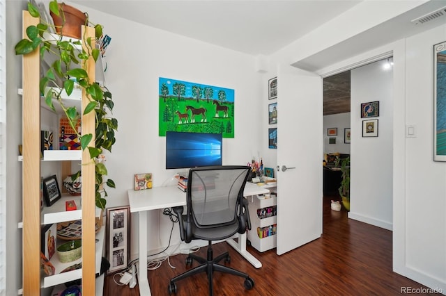 office with dark wood-type flooring