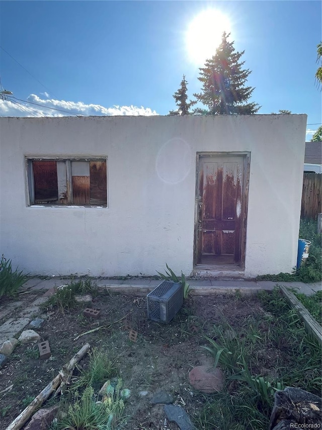 3036 W Clyde Pl, Denver, CO 80211 - view of exterior entry featuring stucco siding
