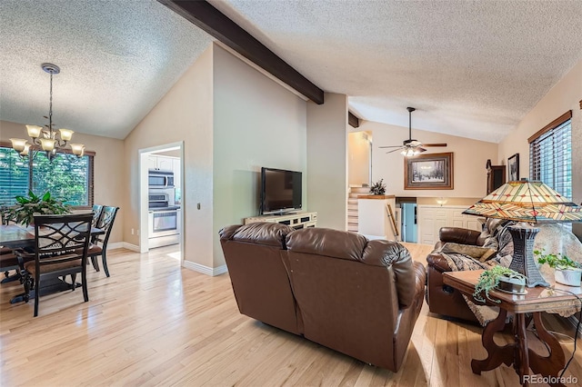 3752 S Helena Way, Aurora, CO 80013 - living room with a textured ceiling, a chandelier, light wood-type flooring, and a ceiling fan