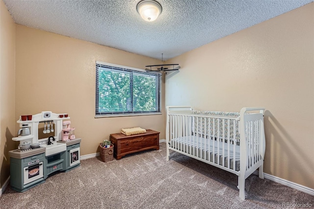 3752 S Helena Way, Aurora, CO 80013 - carpeted bedroom with a textured ceiling, a chandelier, and a crib