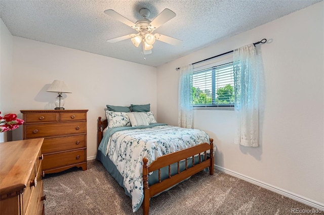 3752 S Helena Way, Aurora, CO 80013 - bedroom featuring carpet flooring, a textured ceiling, and a ceiling fan