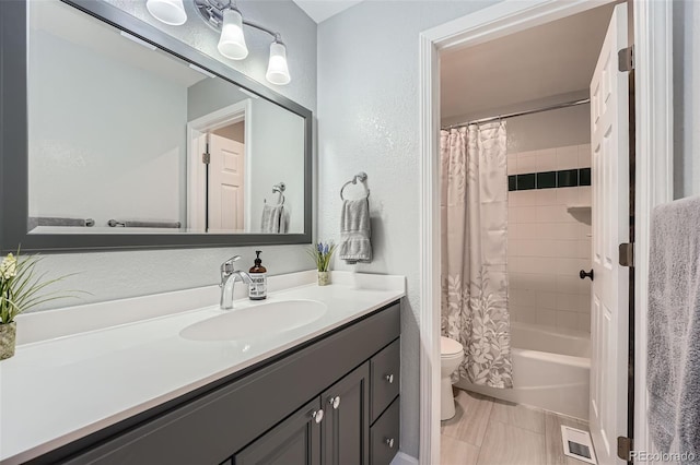 3752 S Helena Way, Aurora, CO 80013 - bathroom with vanity, shower / tub combo, and a textured wall