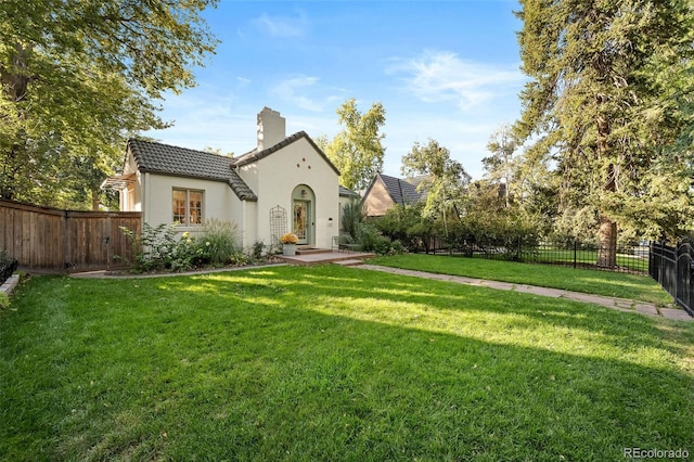 exterior space with a front yard