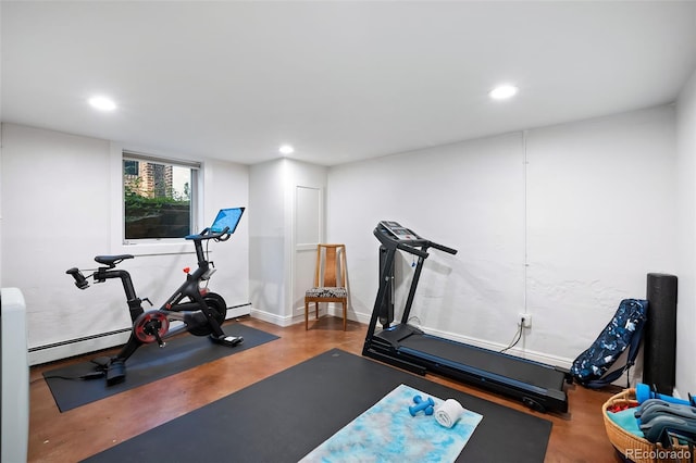 exercise room with baseboard heating