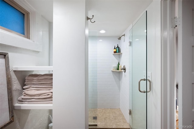 bathroom with an enclosed shower