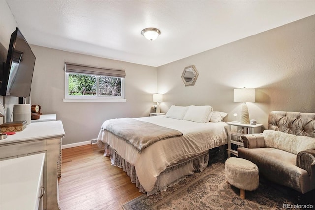 7905 Lowell Blvd Unit B, Westminster, CO 80030 - bedroom with light wood finished floors and baseboards