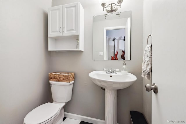 7905 Lowell Blvd Unit B, Westminster, CO 80030 - bathroom featuring toilet and baseboards