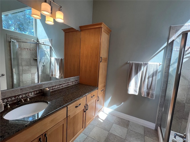 bathroom with vanity and walk in shower