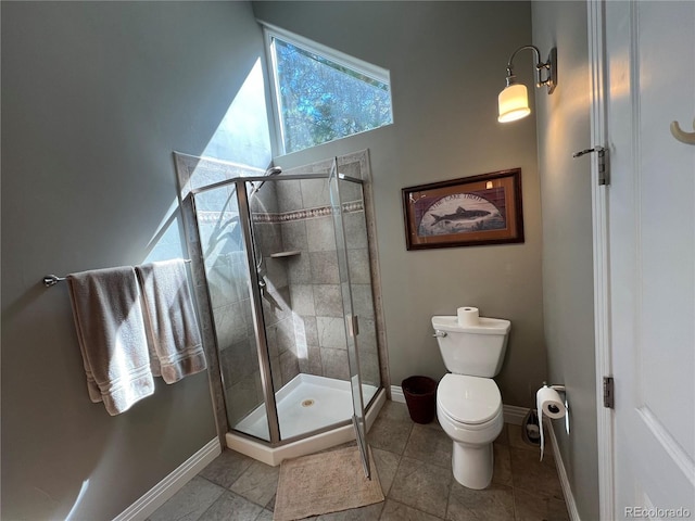 bathroom with toilet and walk in shower