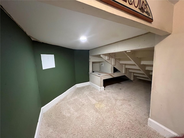 basement with carpet floors